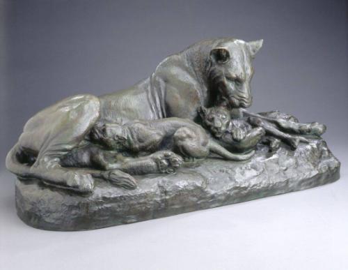 Lioness with Two Cubs